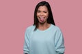 Woman making funny goofy face with tongue sticking out, expressive comedic asian american portrait Royalty Free Stock Photo