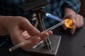 Woman  making glass bead Royalty Free Stock Photo