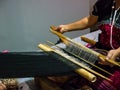 Making handicraft with weaving apparatus Royalty Free Stock Photo