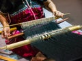 Making handicraft with weaving apparatus Royalty Free Stock Photo