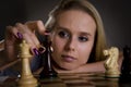 Woman making her move in chess Royalty Free Stock Photo