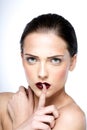 Woman making a hush gesture Royalty Free Stock Photo