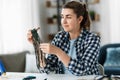 woman making or knotting macrame on table at home Royalty Free Stock Photo