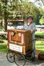 Woman making music with an old carillon Royalty Free Stock Photo