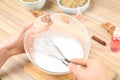 Woman making natural handmade soap at table, closeup