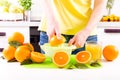 Woman making orange juice Royalty Free Stock Photo