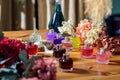 Woman making perfume with test tubes in craft workshop