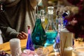 Woman making perfume with test tubes in craft workshop Royalty Free Stock Photo