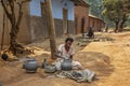 Woman making pottery in Uganda, Africa