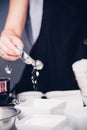 Woman during making pour measure dough Royalty Free Stock Photo