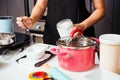 Woman during making pour measure dough before cooking bakery Royalty Free Stock Photo