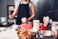 Woman during making pour measure dough before cooking bakery Royalty Free Stock Photo