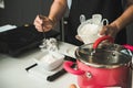 Woman during making pour measure dough Royalty Free Stock Photo