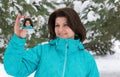 Woman is making a salfi in snowy forest Royalty Free Stock Photo