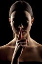 Woman making silence gesture Royalty Free Stock Photo