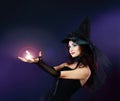 Woman making spell with magic fireball Royalty Free Stock Photo
