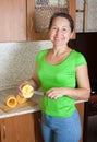 Woman making stuffed vegetable marrow Royalty Free Stock Photo