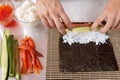 Woman making sushi rolls Royalty Free Stock Photo