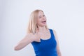 Woman making thumbs up gesture on white isolated background. Woman making sign ok, good with her hand Royalty Free Stock Photo