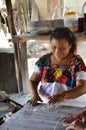 Woman making Tortillas in traditional way