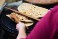 A woman making a traditional gozleme.