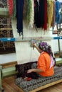 A woman making Traditional Turkish Carpet