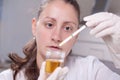 Woman making urine test