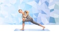 Woman making yoga low angle lunge pose on mat Royalty Free Stock Photo