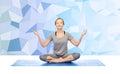 Woman making yoga meditation in lotus pose on mat Royalty Free Stock Photo