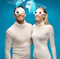 Woman and man in 3d glasses looking at globe model