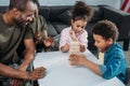 Woman and man in army uniform with their children