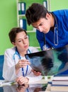 Woman and man doctors radiologists working at the clinic