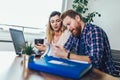 Woman and man doing paperwork together, they report online tax