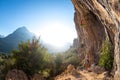 Woman and man are engaged in rock climbing on vacation