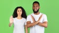 Woman And Man Gesturing Stop Standing On Green Background, Panorama Royalty Free Stock Photo