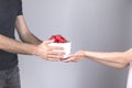 Woman and man hand gift box Royalty Free Stock Photo