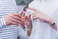 Woman and man hold martini glasses in their hands Royalty Free Stock Photo