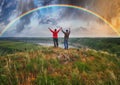 Woman and man Looking At Rainbow Royalty Free Stock Photo