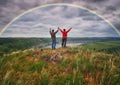 Woman and man Looking At Rainbow Royalty Free Stock Photo