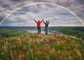 Woman and man Looking At Rainbow Royalty Free Stock Photo