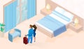 Woman and Man with Luggage Arriving in Hotel Room Royalty Free Stock Photo