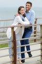 woman and man on pier at lake Royalty Free Stock Photo