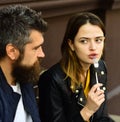 Woman and man with surprised faces have date at cafe. Royalty Free Stock Photo