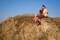 Woman and man on the top of a mountain