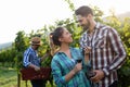 Woman and man in vineyard drinking wine Royalty Free Stock Photo