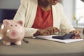 Woman managing her personal budget, calculating her income tax or business profits