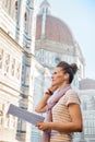 Woman with map and audio guide in florence, italy Royalty Free Stock Photo