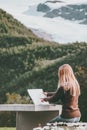 Woman with map planning journey route in Norway sitting at the table Travel Lifestyle concept adventure Royalty Free Stock Photo