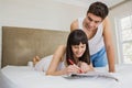 Woman marking classified ads in newspaper