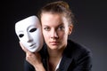 Woman with the mask in hypocrisy concept Royalty Free Stock Photo